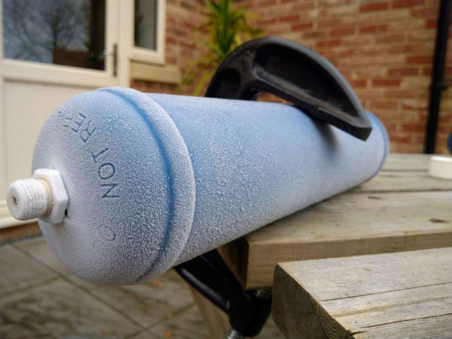 The gas inside the bottle highly pressurised and is extremely cold. Picture: Tim Chapman