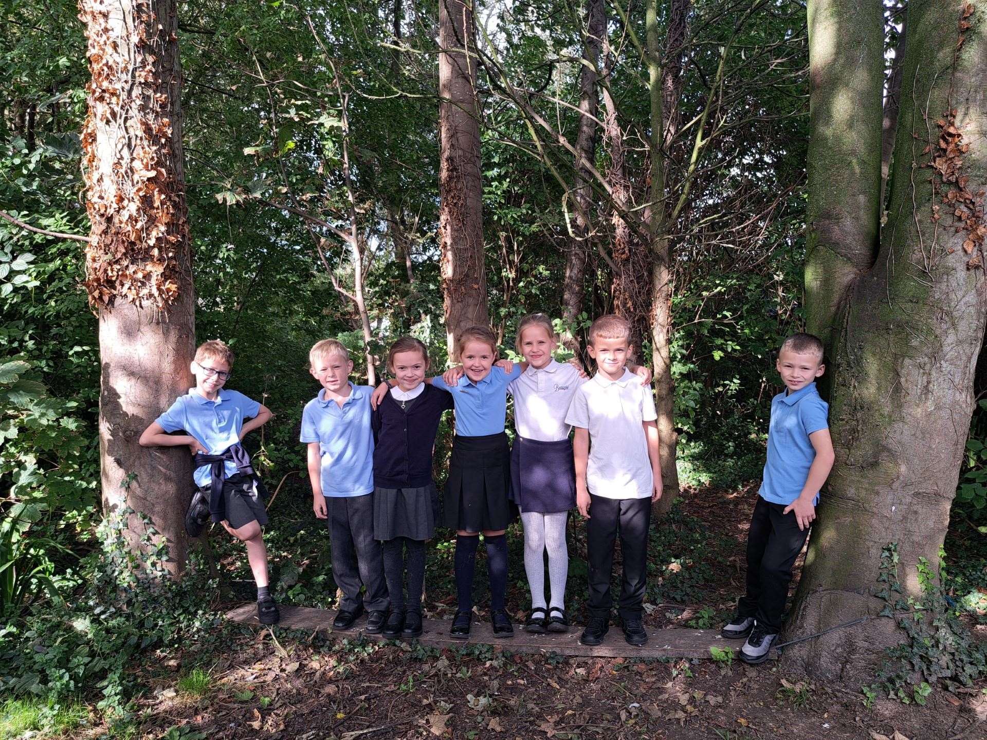 Some of the pupils in the school's forest area, which it is hoped will be enhanced by the project.