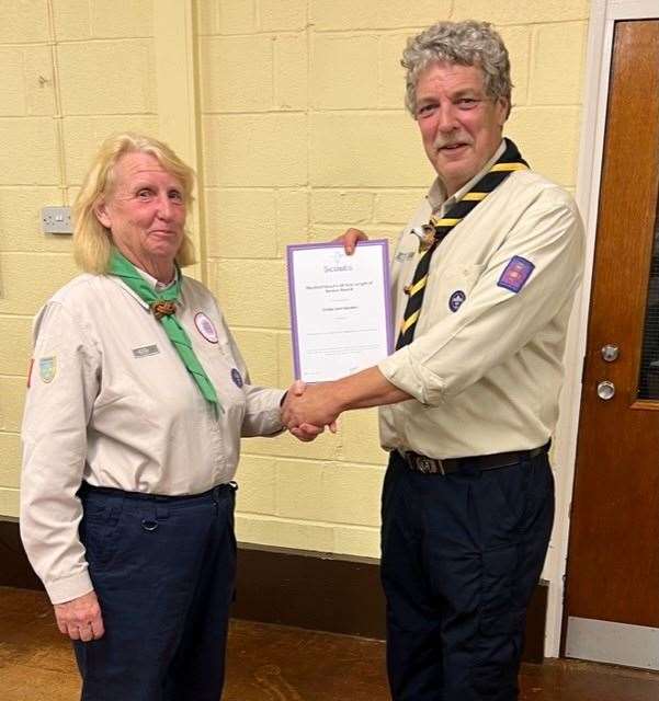 Linda Goakes has served 1st March Scout Group for over 50 years, she was presented with her award by Fenland District Commissioner Ian Bullard.
