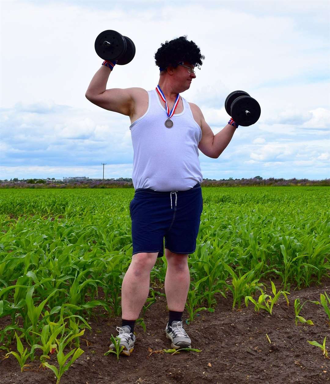 Skylark staff Weightlifting in the Maize Maze.