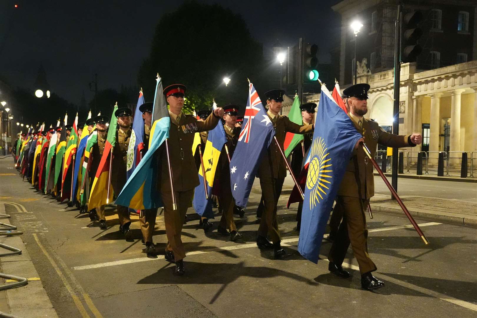 Flags of the Commonwealth are carried during the rehearsal (Lucy North/PA)
