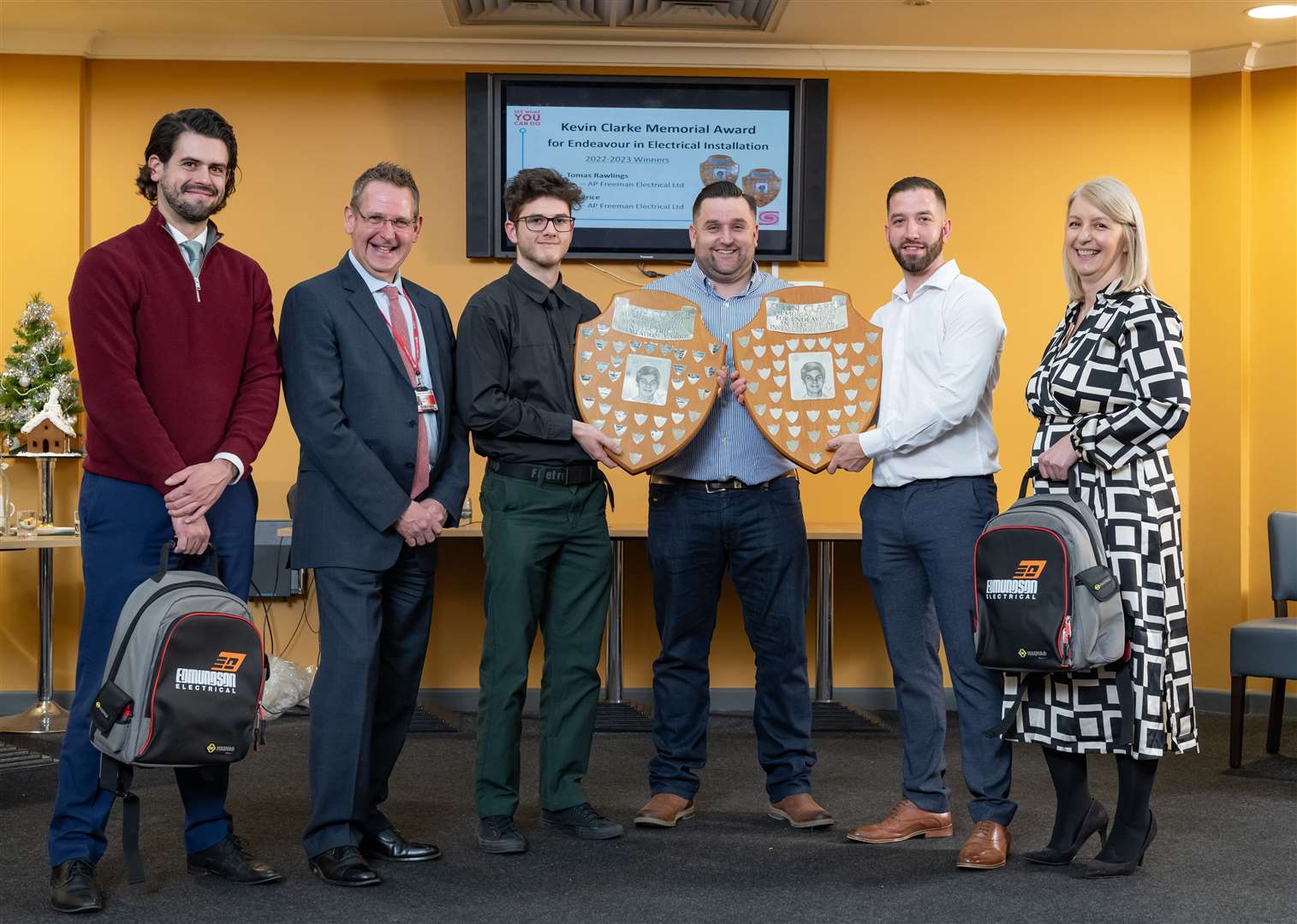 CWA Principal David Pomfret with winners of the Kevin Clarke Award, Ian and Tomas. Joined by Nick Goodchild of Edmondson Electrical, Alex Freeman of AP Freeman, and Petula Harrington, sister of the late Kevin Clarke. Photo: CWA/Paul Tibbs.