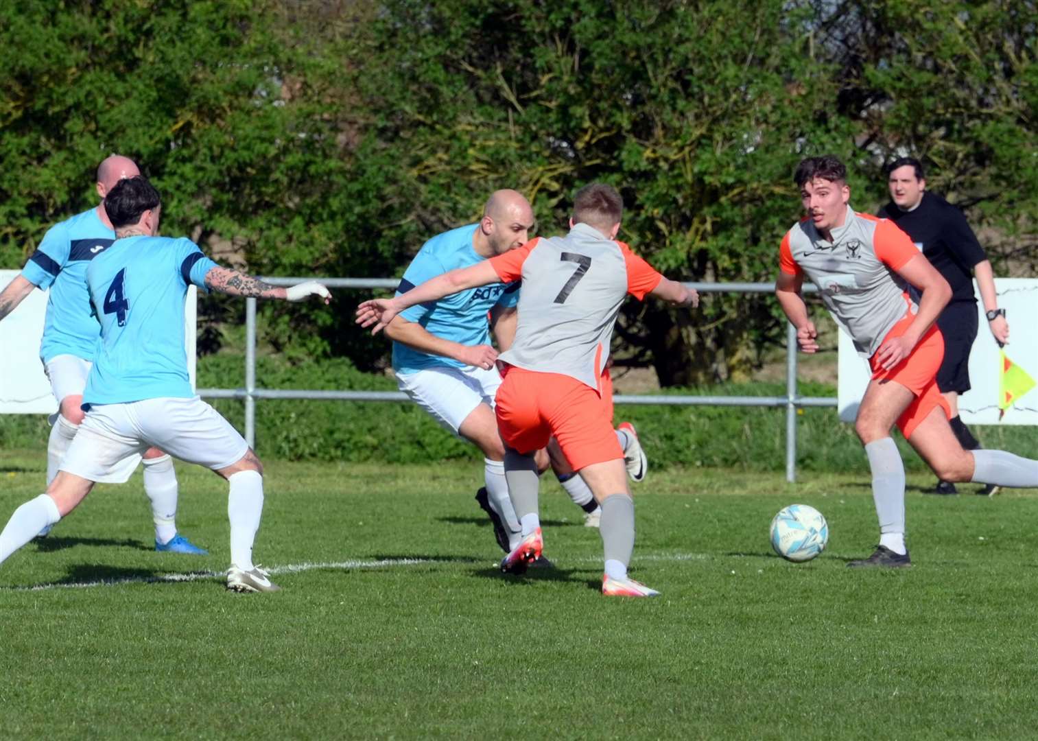 Parson Drove (grey and orange) v Holland (blue). Jack Prentice and Harrison Taylor, number seven