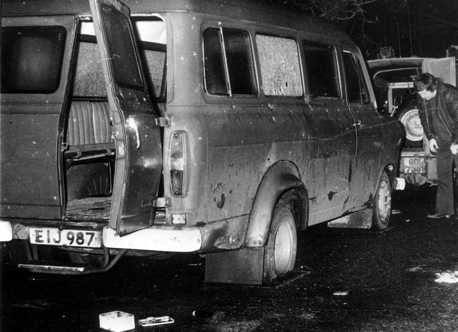 The bullet riddled minibus that the men were travelling in (PA)
