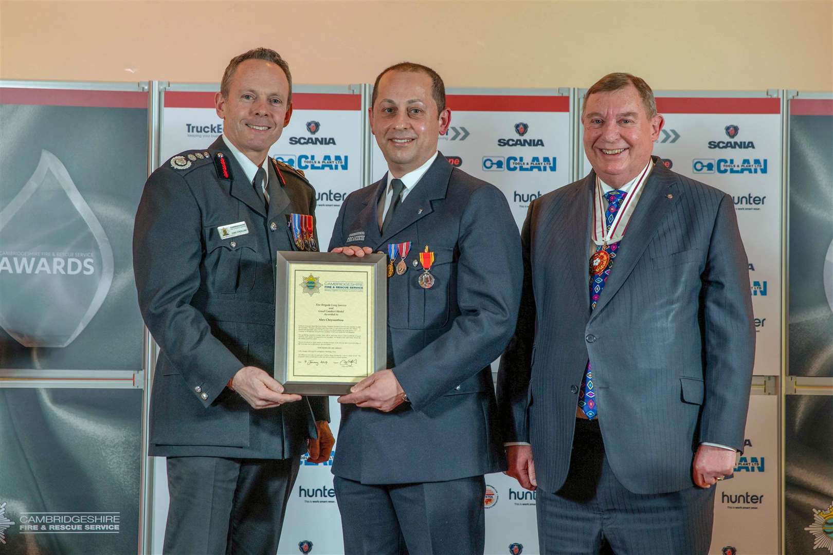 Alex Chrysantou receives his 20 years long service award. (6784137)