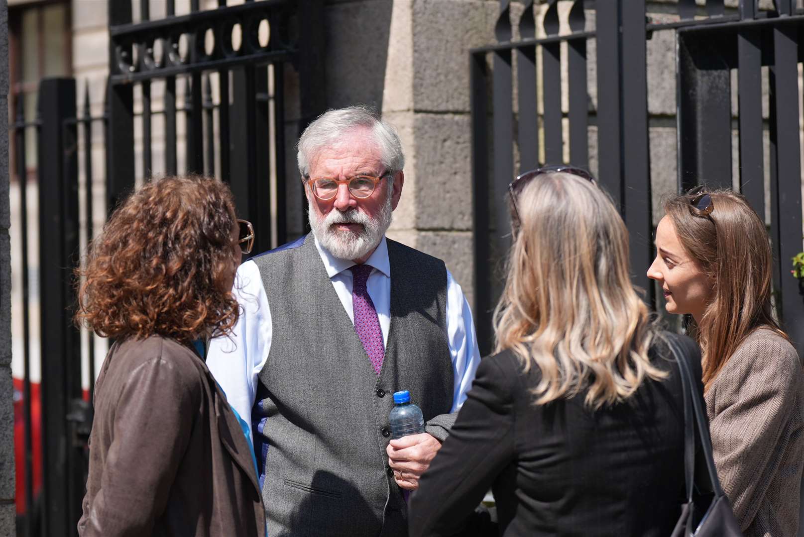 Former Sinn Fein president Gerry Adams speaks with members of the public outside the High Court in Dublin (Niall Carson/PA)