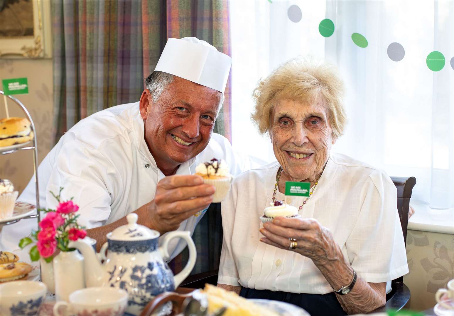 FC Chef Wayne Woolman and resident Joyce Wardle have been busy baking for Macmillan