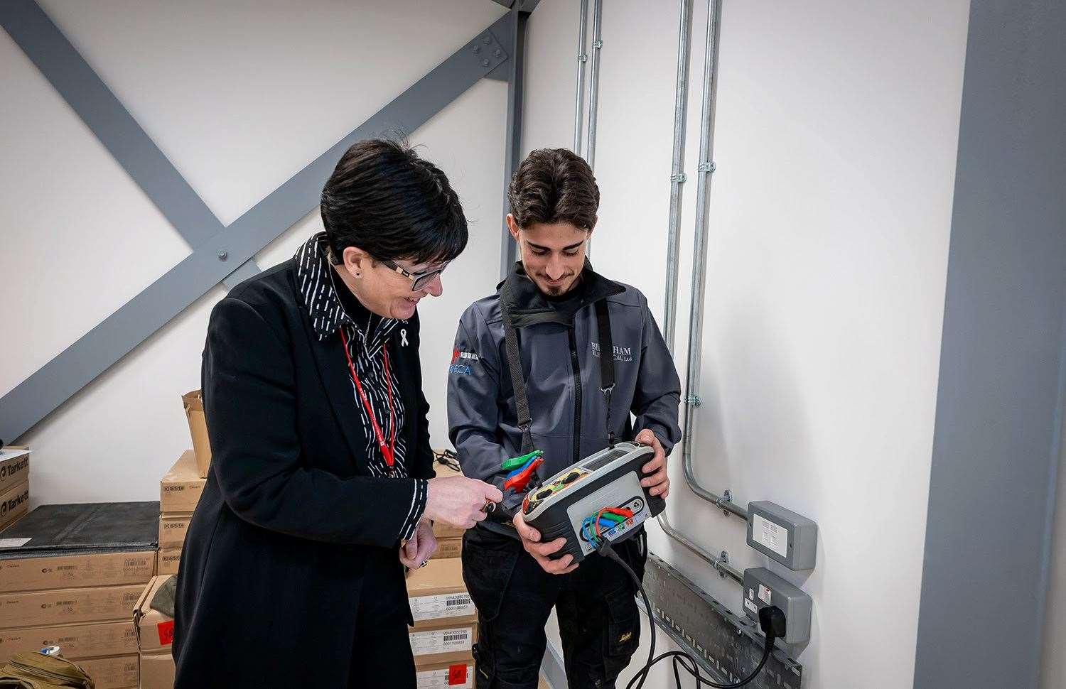 Kerry Heathcote, deputy chief executive and vice-principal, visited Bramham Electrical in Lynn and apprentice Charlie Moore. Picture: College of West Anglia