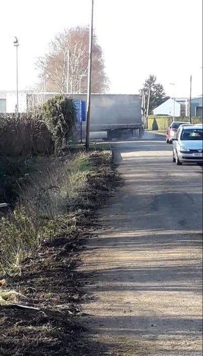 New Bridge Lane is already busy with lorries because of the businesses and factories located along it. (28593873)