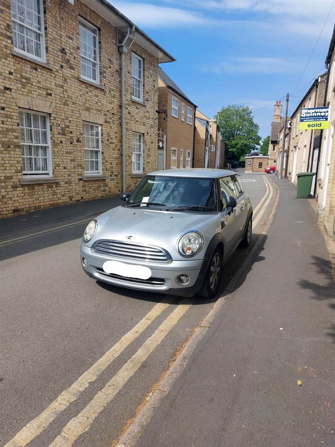 This Mini driver parked on double yellow lines