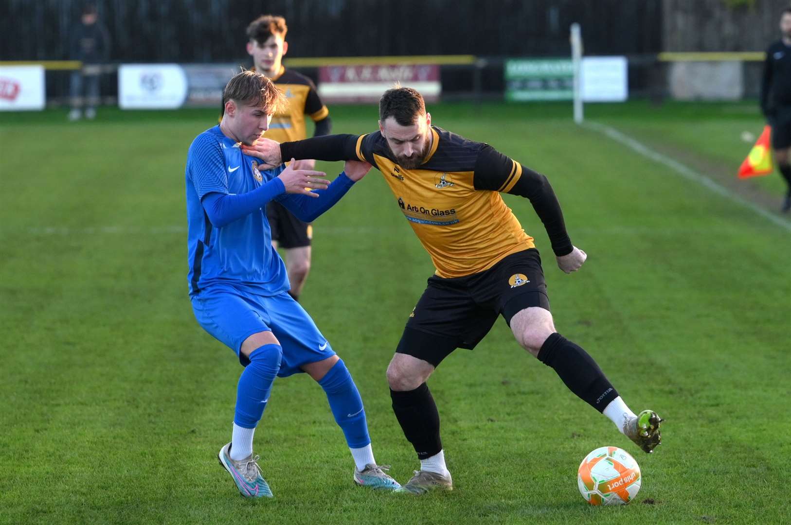 Josh Moreman battles for possession