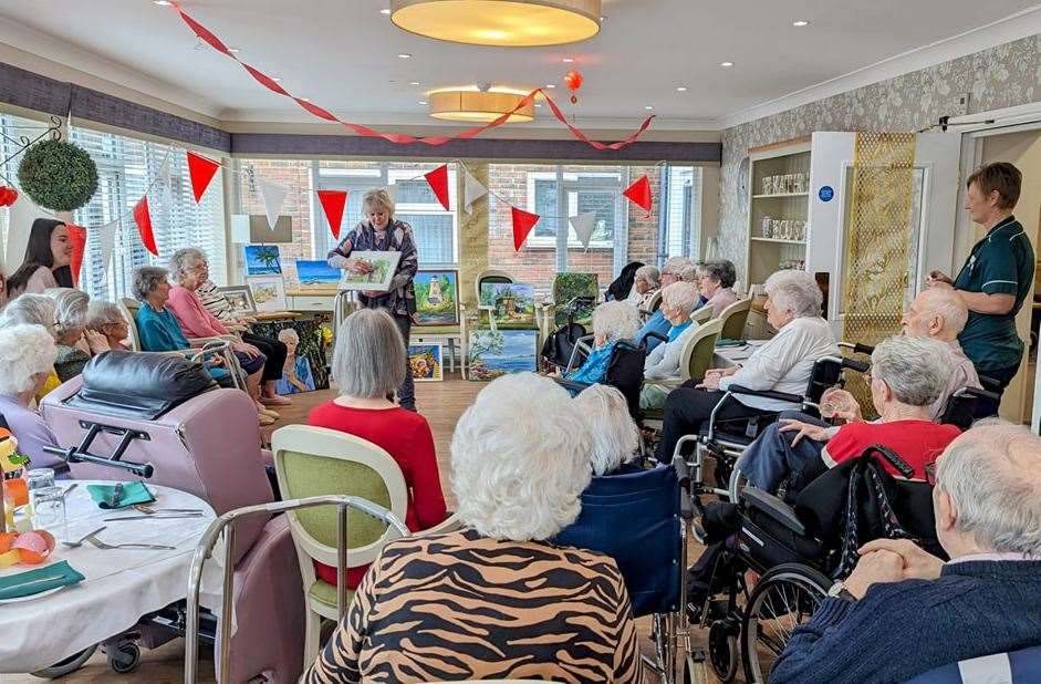 Gill Repper donates to Hickathrift House Care Home