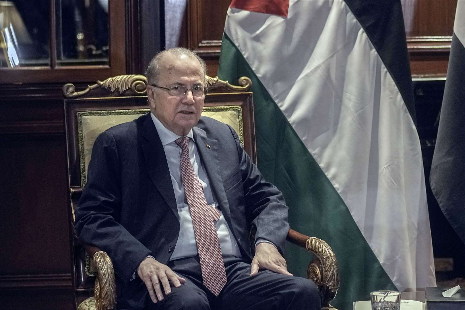 Palestinian Prime Minister Mohammad Mustafa met Mr Harris in Munich (Amr Nabil/AP)