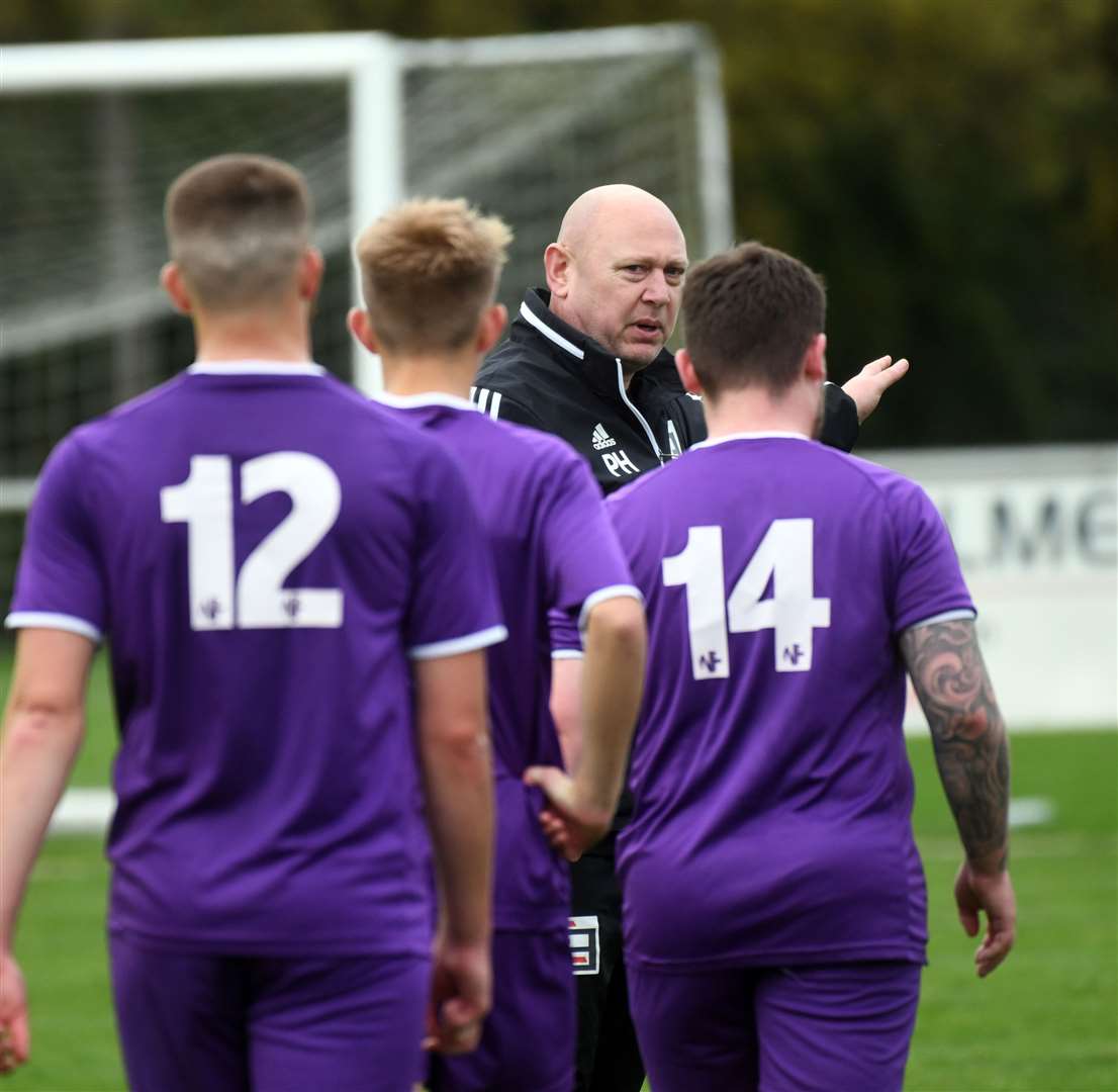 Paul Hunt with his players