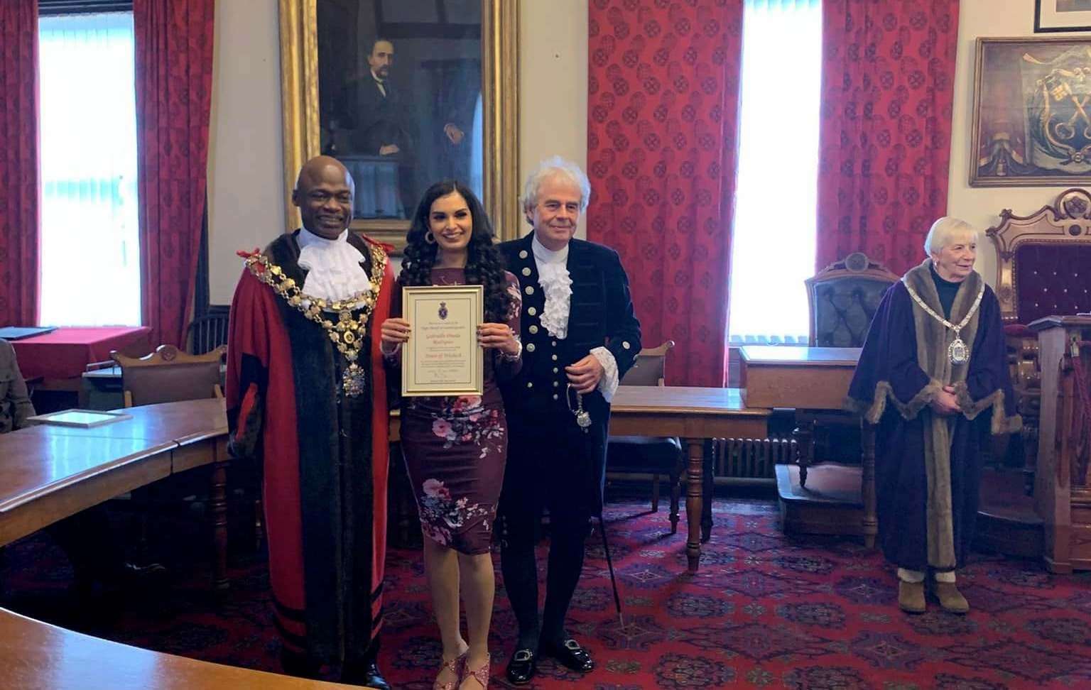Trained opera singer Gabriella Pineda Rodrigues with myaor Sidney Imafidon and the High Sheriff, David Way