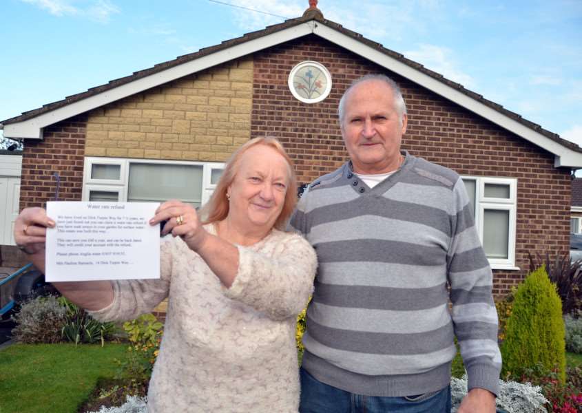 Pauline and Michael Barnacle with their written warning for neighborus. SG191116-172TW