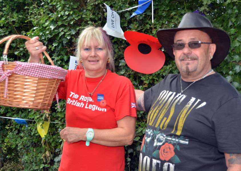 Gedney Dawsmere's annual Armed Forces Day involved 'Poppy Appeal organiser Christine Mitchell and RBL branch vice chairman Nick Chapman. Photo by Tim Wilson. ''SG240617-202TW.