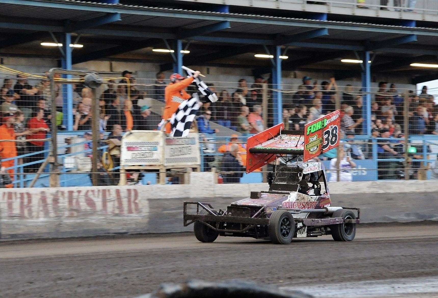 The crowd erupts as Polley crosses the finish line (Picture: Colin Casserley)
