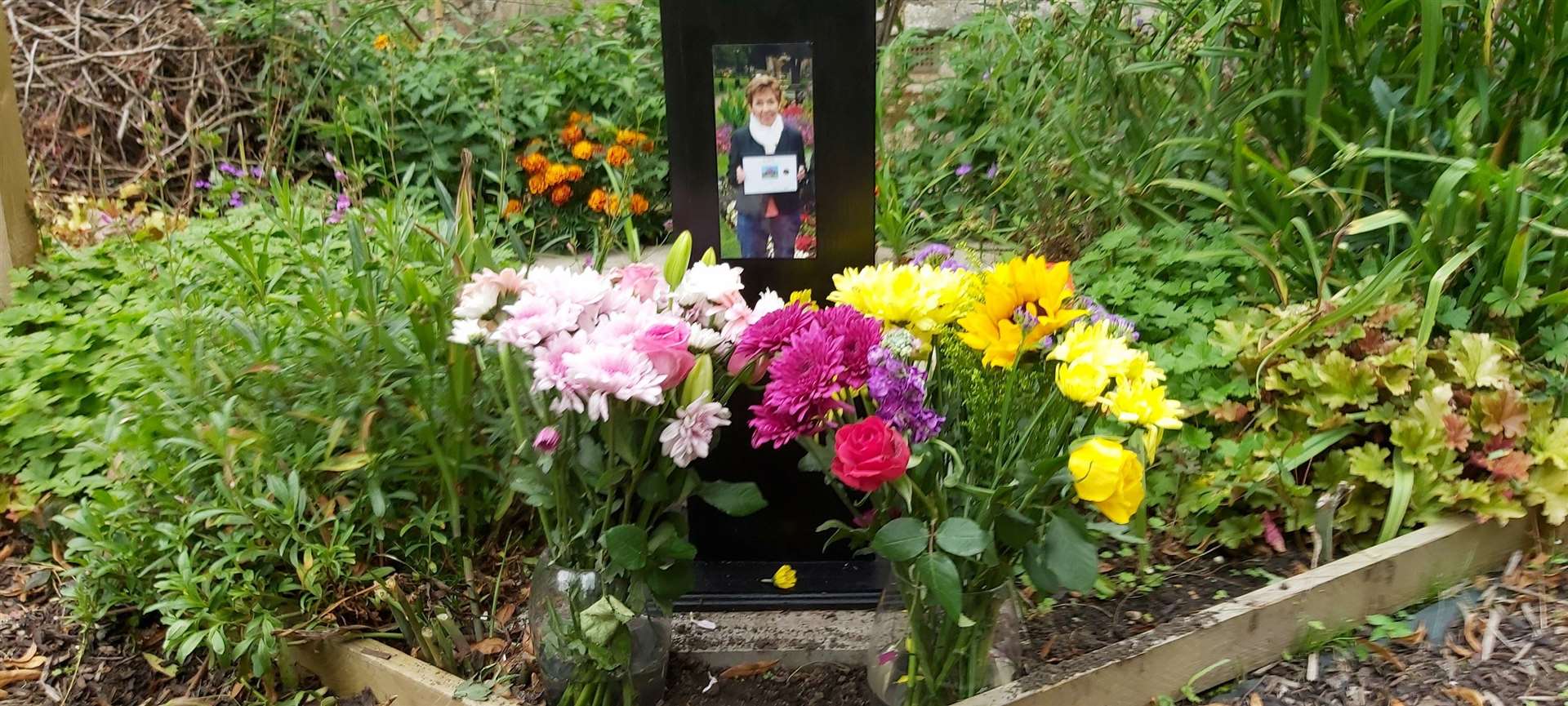 A tribute has been placed in the well-being garden at St Peter's Church which Penny helped build earlier this year and people are invited to lay their own flowers in her memory.