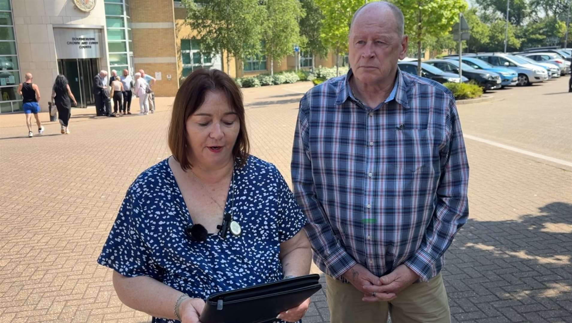 Lyn and Christopher Roe, the grandparents of Zac Roe, speaking to media outside Bournemouth Crown Court after Barbara Roe was jailed (Ben Mitchell/PA)