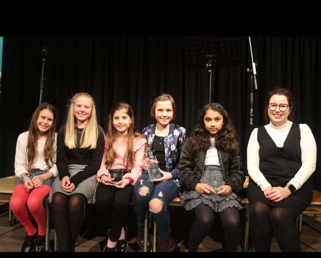 Entrants in the junior Fenland Poet Laureate from left: Alice Blundy-Gent, Isabelle Brown-Ahern, Amelie Barclay, Isabelle Slade Stollery, Arya Patel and Grammar School teacher Mrs Kember-Whitfield, t. Photo: Tim Chapman. (60877219)