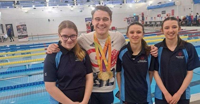 Alice Camplin, Hannah Camplin and Annie Gooch at a special Olympics swim gala