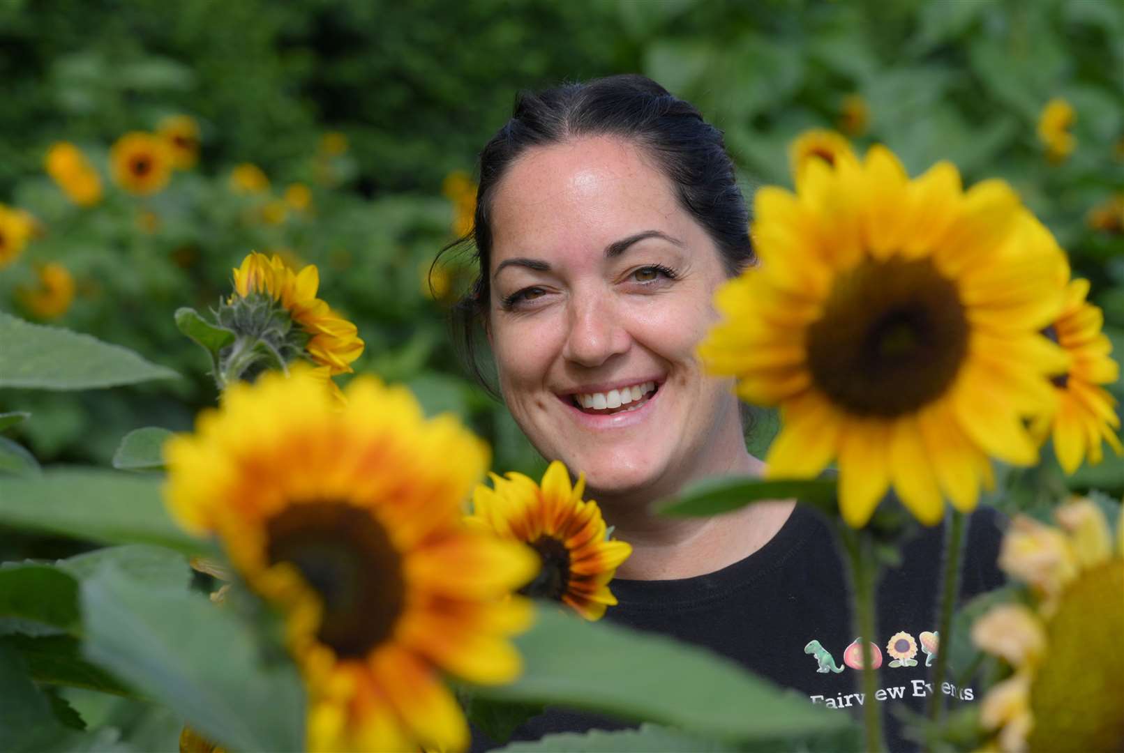 Nicola Lintern pictured among the sunflowers.