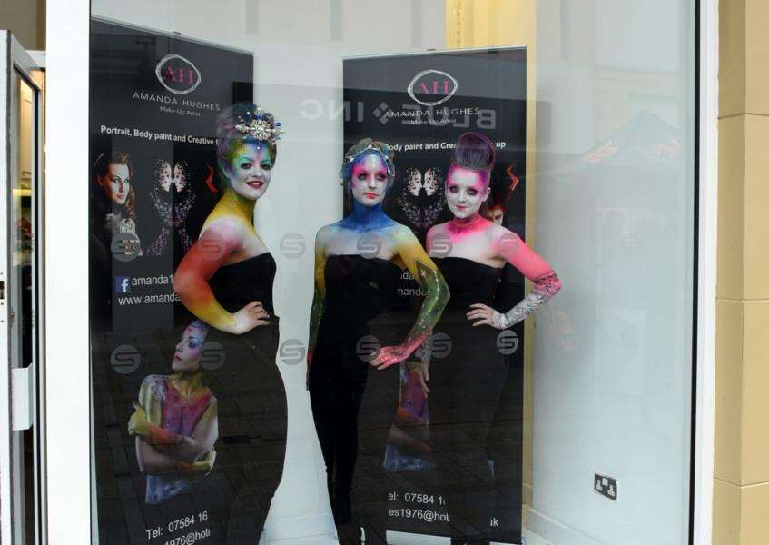 People in body paint in the window scaring people 'left to right Justine Cotton, Vicky Townsend and Carly Hain ANL-151026-082750009