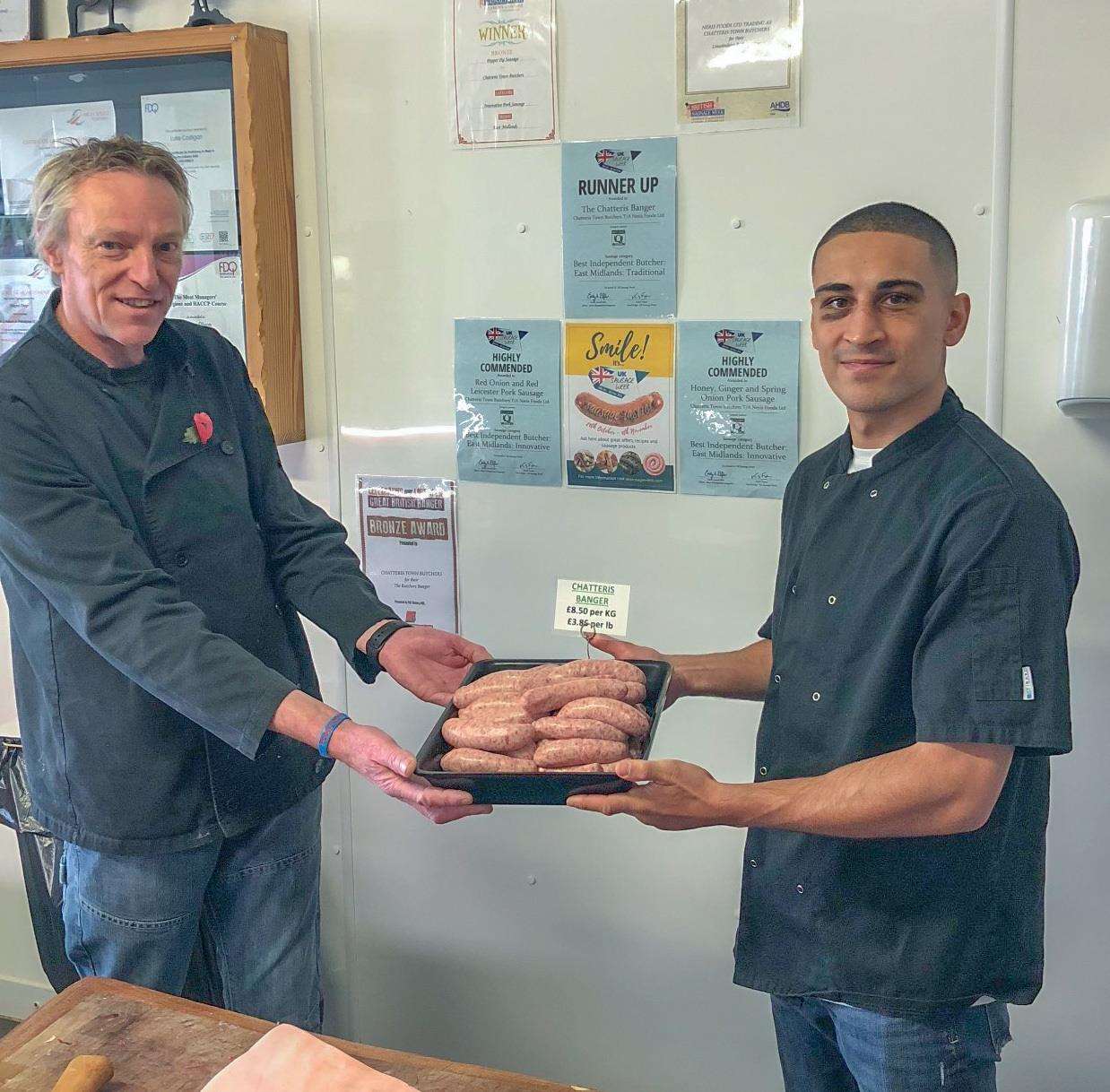 Butcher Nigel Colam with champion boxer Jordan Gill. (5161579)