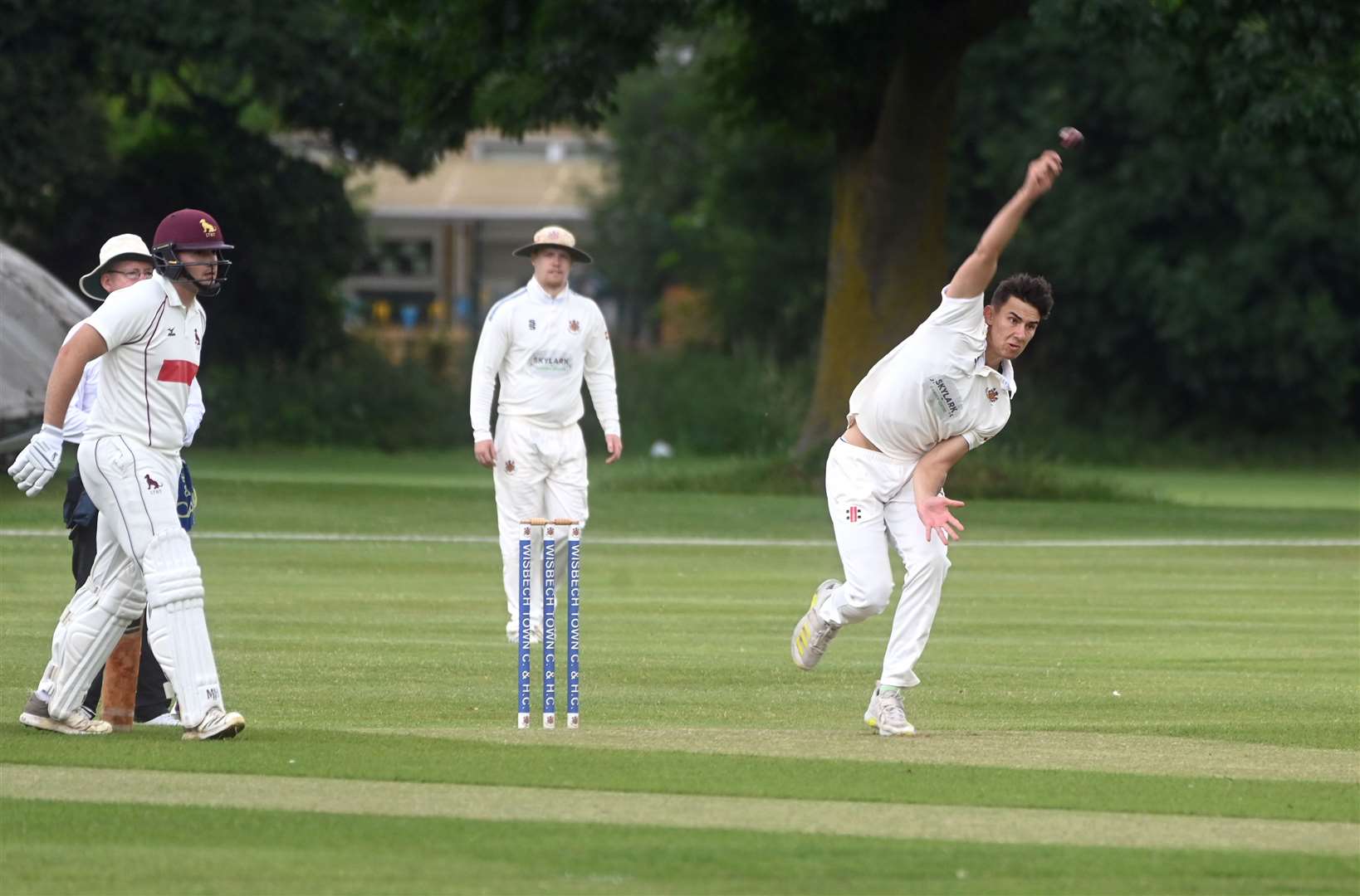 George Gowler bowling for Wisbech against Sudbury