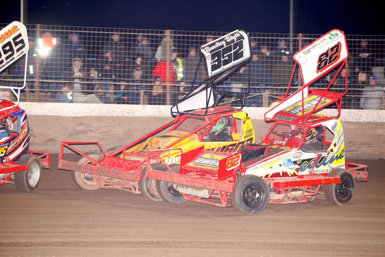 Number 352 Bradley Blyth had a dream debut in the F1 stock cars and is seen here battling for the lead with Sheffield’s 82 Karl Moseley. Picture: Dave Bastock.