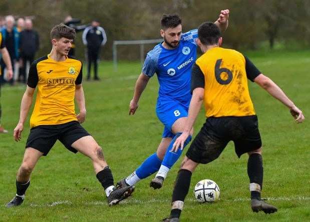 Action from the game between Outwell Swifts (blue) and March Town A (black and amber). Picture: Andrew Lister