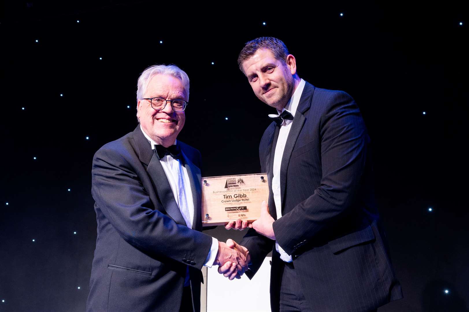 John Weston, associate partner of sponsors Brown & Co with Tim Gibb, managing director of the Crown Lodge Hotel at Outwell, who won Businessperson of the Year at the 2024 Mayor's Business Awards. Picture: Ian Burt