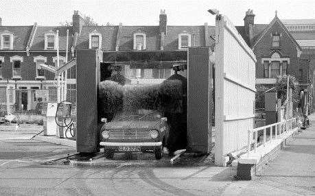 A car goes through the car wash at a petrol station in Fulham, despite the hose pipe ban that had been enforced by Thames Valley Water Authority in response to the nationwide drought. Photo credit: Sport and General/S&G and Barratts/EMPICS Archive.