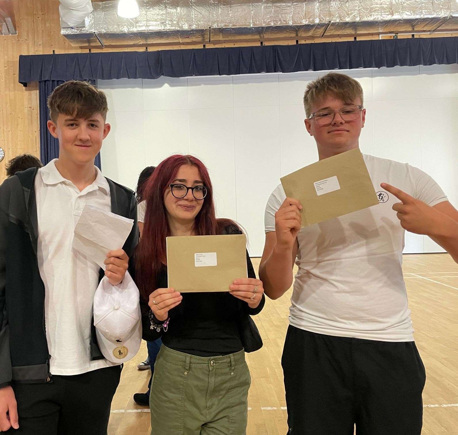 From left with their results at the Neale-Wade are: Archie Lyons, Millie Cover, and Henry Gatland-Shaw. Picture: Sarah Cliss.
