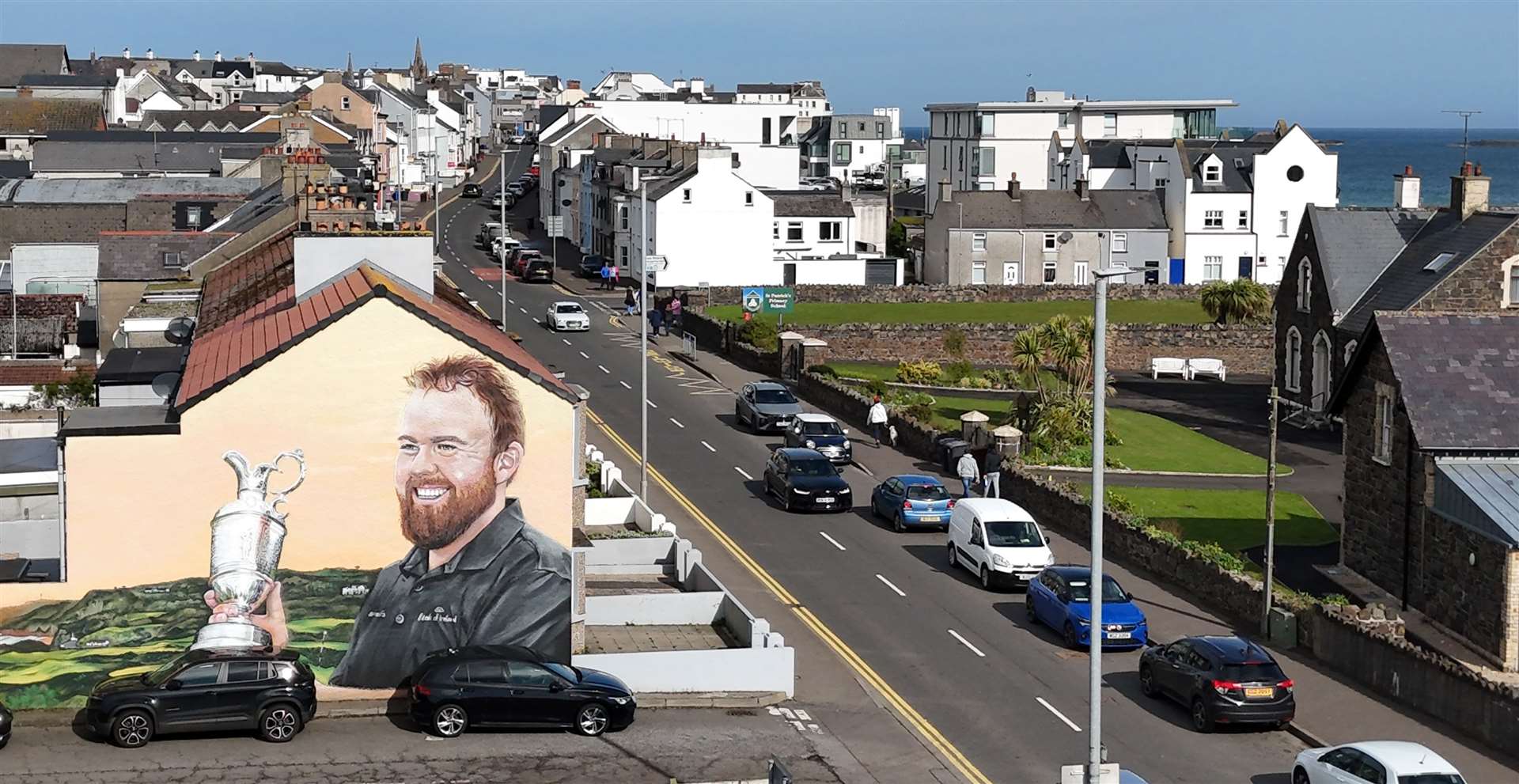 A mural of Shane Lowry with the Claret Jug painted on a house near the entrance of Royal Portrush Golf Club in Northern Ireland (Niall Carson/PA)