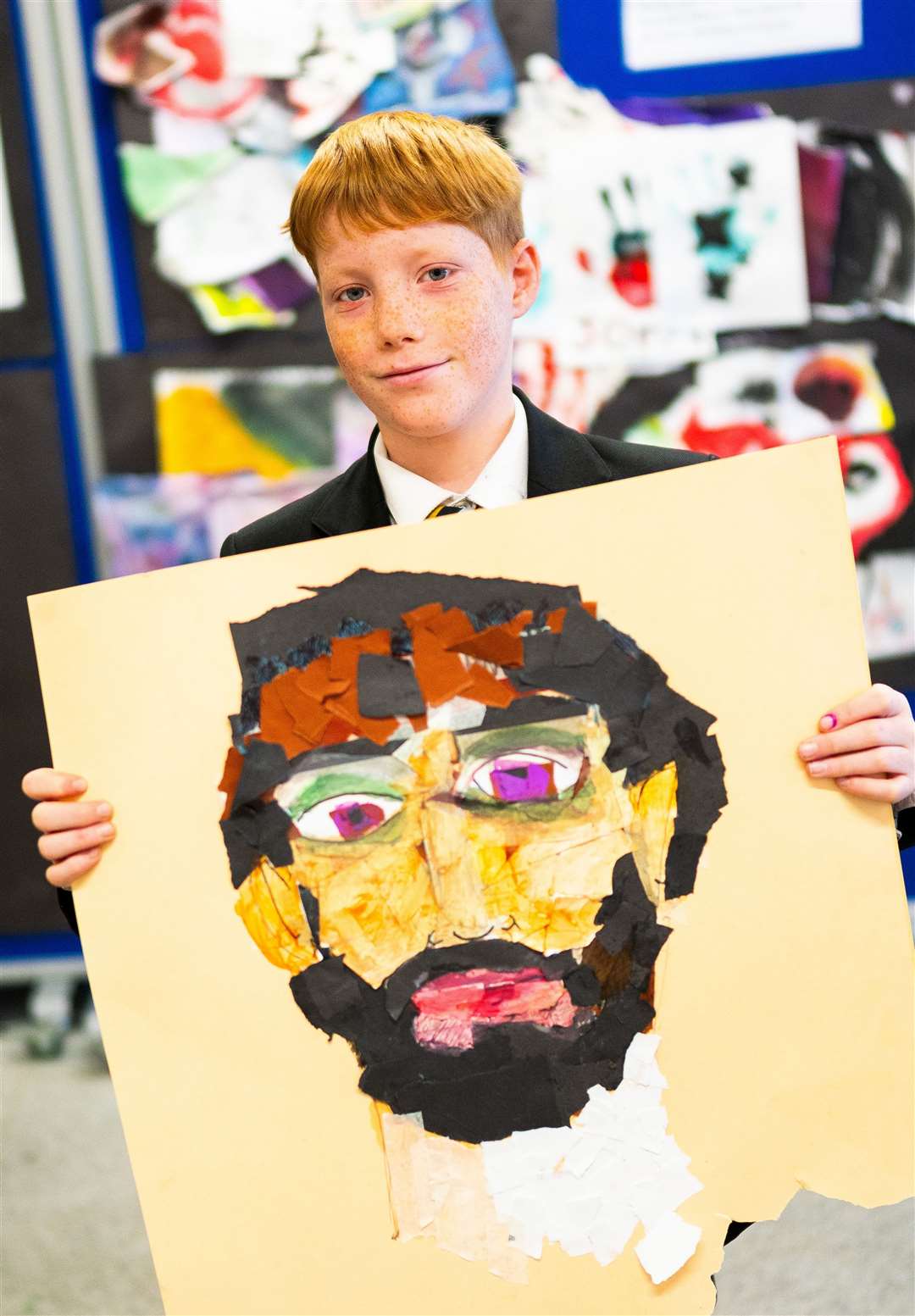 One of the students with his artwork.
