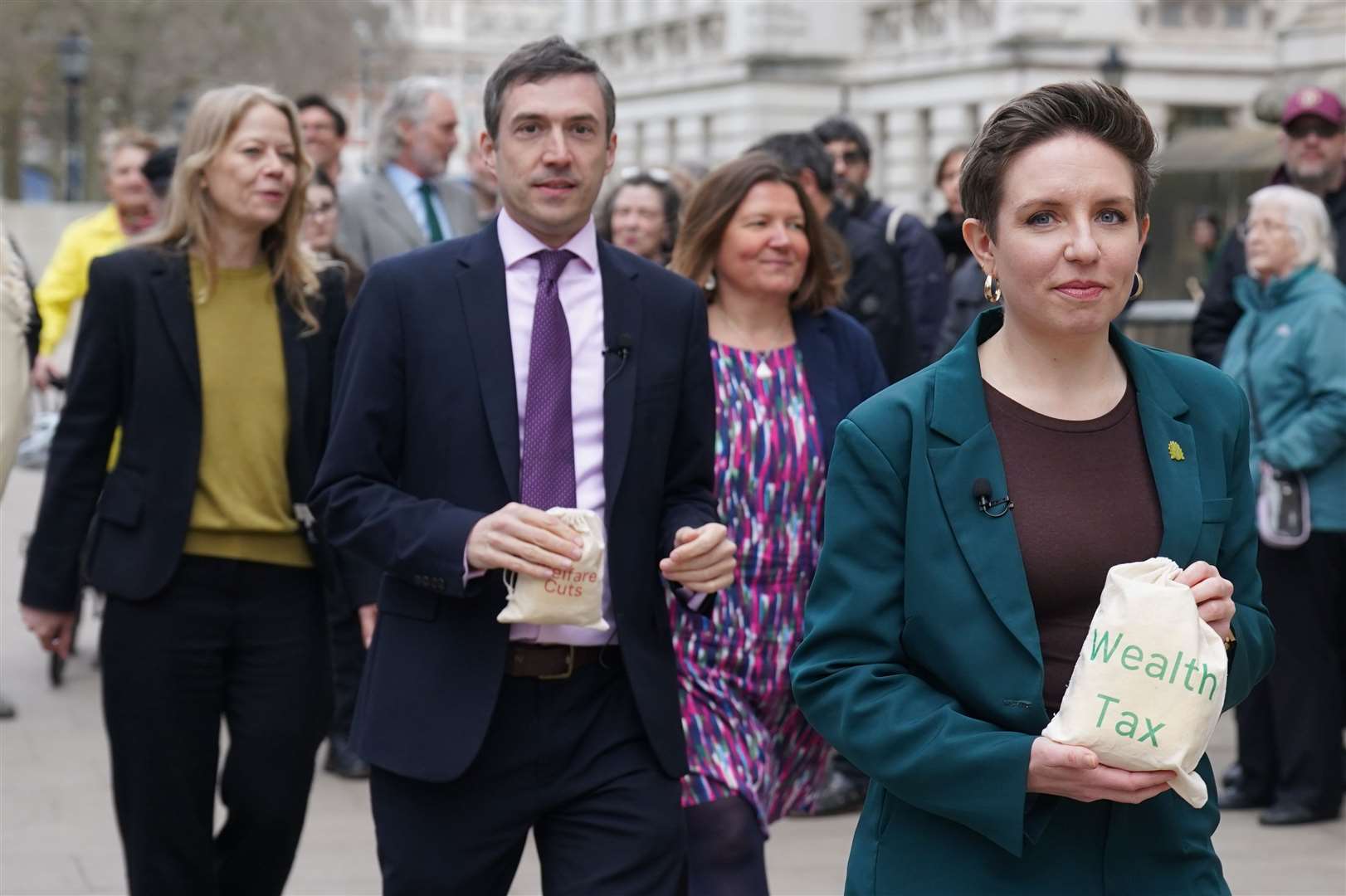 Green Party MPs (left to right) Sian Berry, Adrian Ramsay, Ellie Chowns and Carla Denyer arrive at HM Treasury, London (Stefan Rousseau/PA)