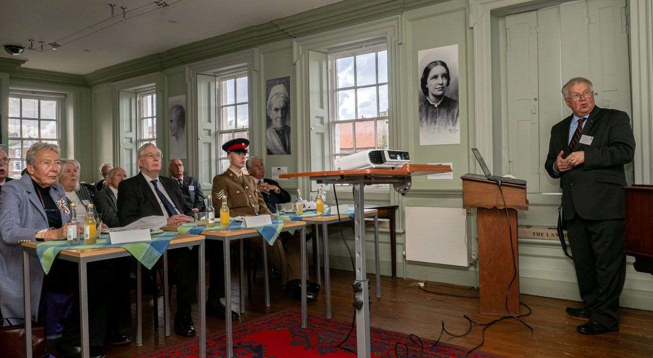 M Knight delivering the presentation to the visitors