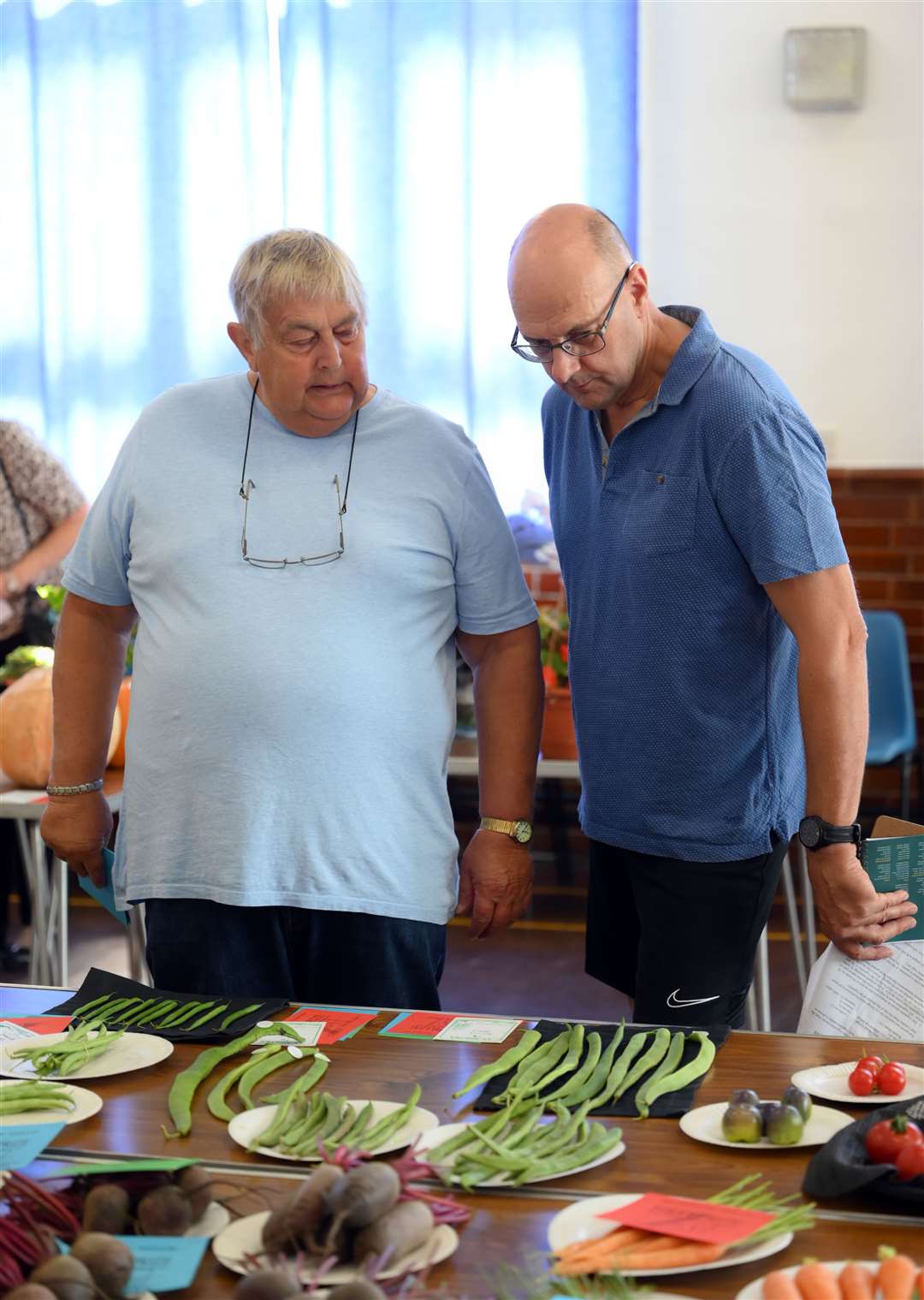 Roger Reader and David Scrimshaw with some of the vegetable exhibits.