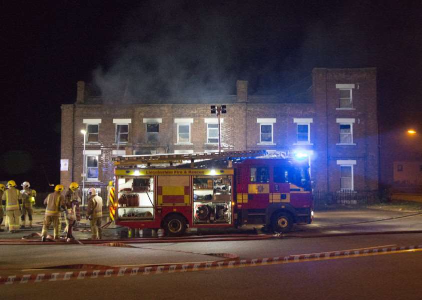 Firefighters tackling last night's massive fire at the Bridge Hotel. Photo: MIKE BARTON