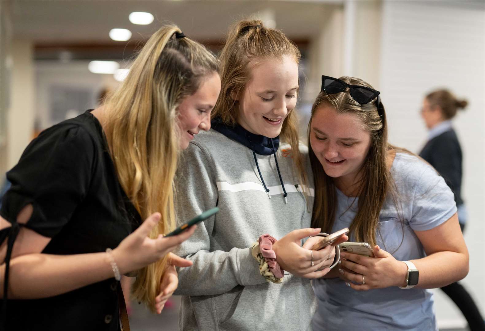 Students check in as they receive their results. (58731114)
