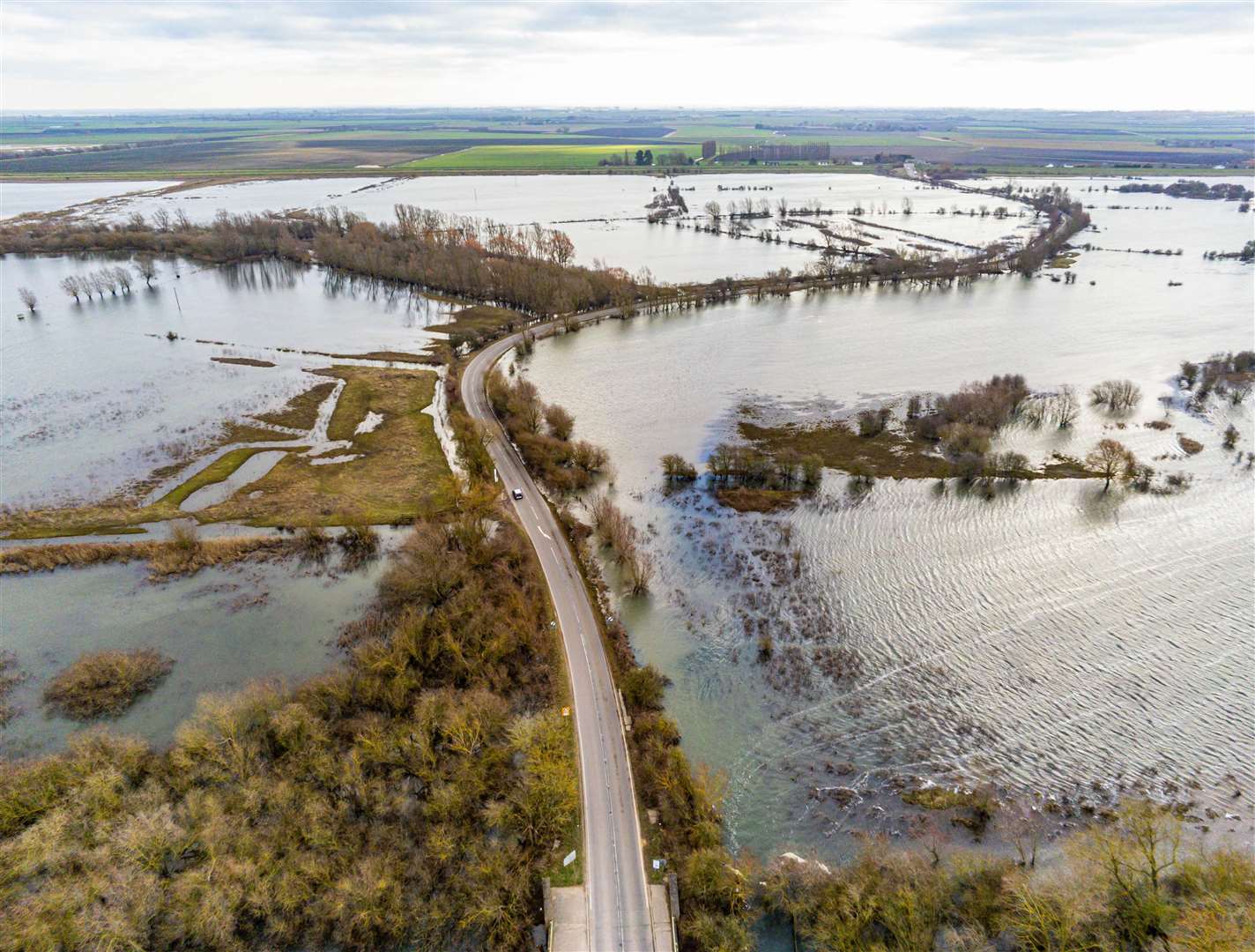 Welney Wash Road is frequently covered by floodwater