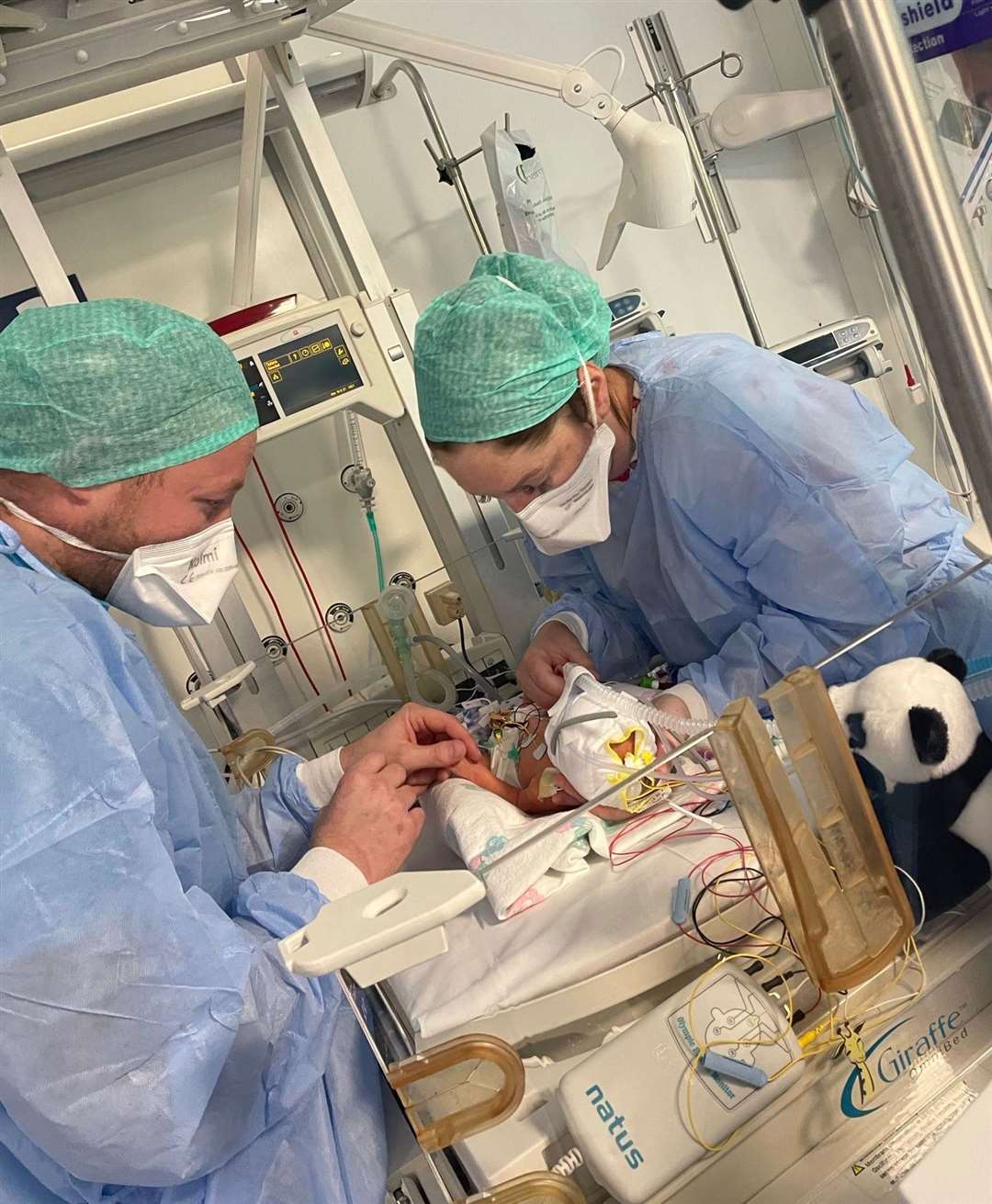Kirsty and Ricky with Scarlett in the specialist care unit.