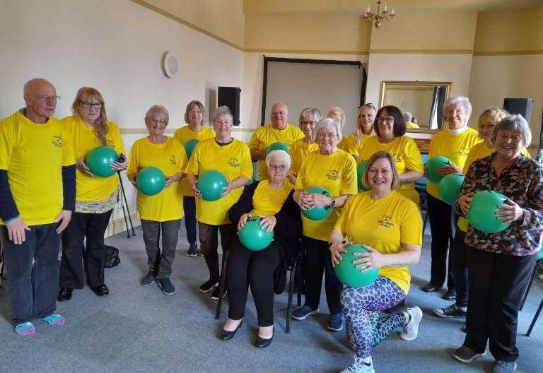 Fitness instructor runs exercise and social classes for older people