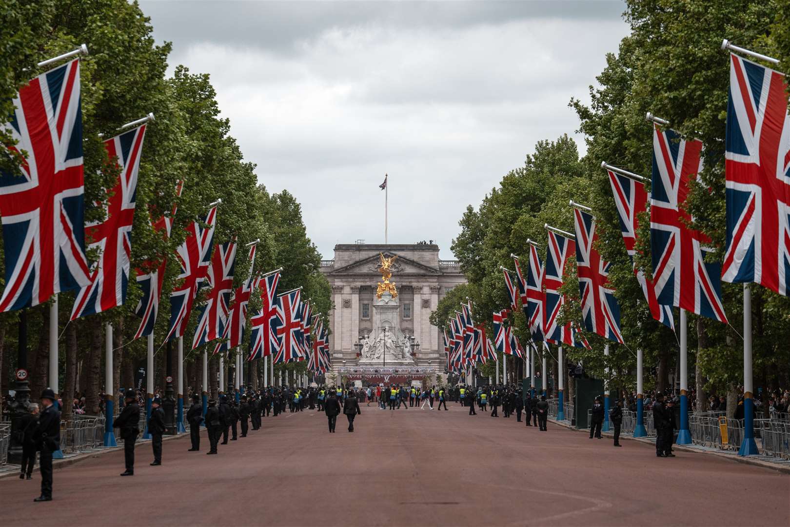 People gather on The Mall ahead of a military procession marking the 80th anniversary of VE Day (Carl Court/PA)