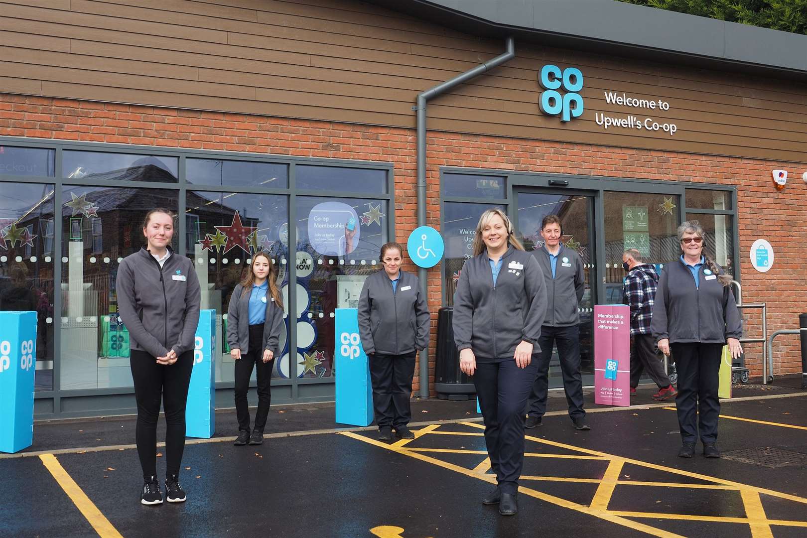 The Co-op Food.Town Street, Upwell. Member pioneer Caitlin Leonard (far left), Manager Lucy King (front). (53353224)