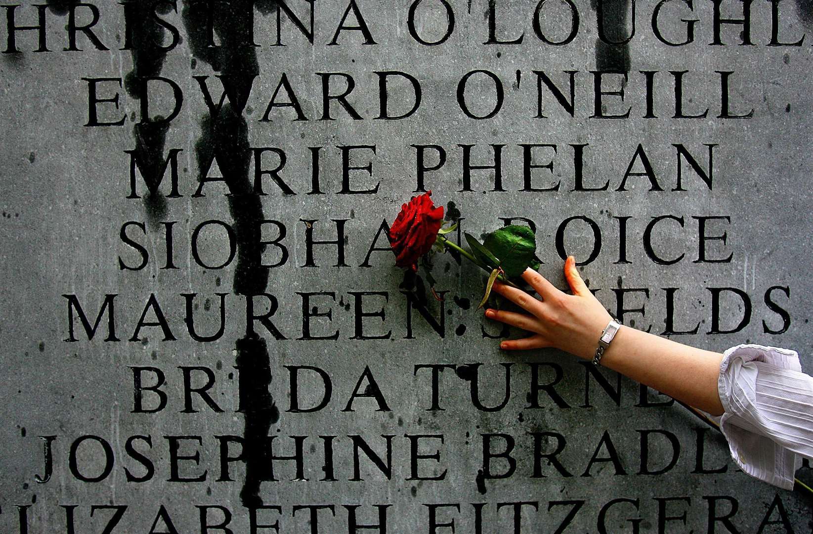 A single red rose is placed on the memorial on Talbot Street in Dublin to the victims of the Dublin and Monaghan bombings in 1974 (Julien Behal/PA)