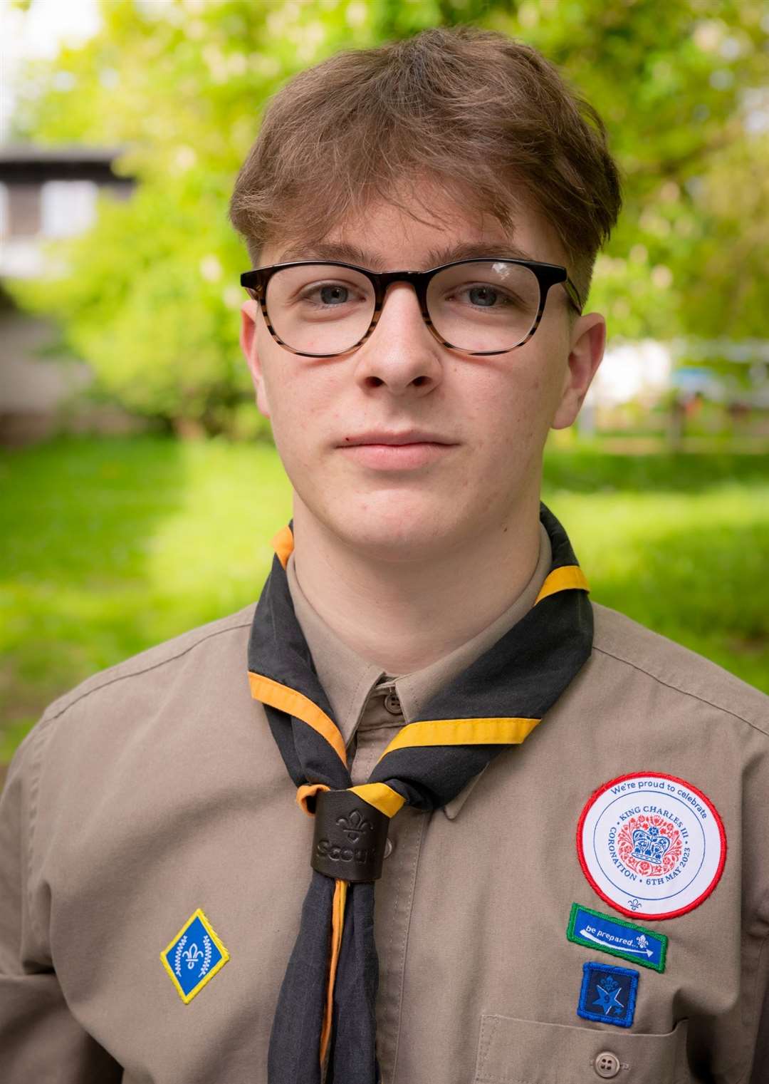 Henry Fuller from Wisbech was among 50 scouts invited to attend the coronation from across the country. He was even lucky enough to meet singer Katy Perry and is pictured standing to her left.