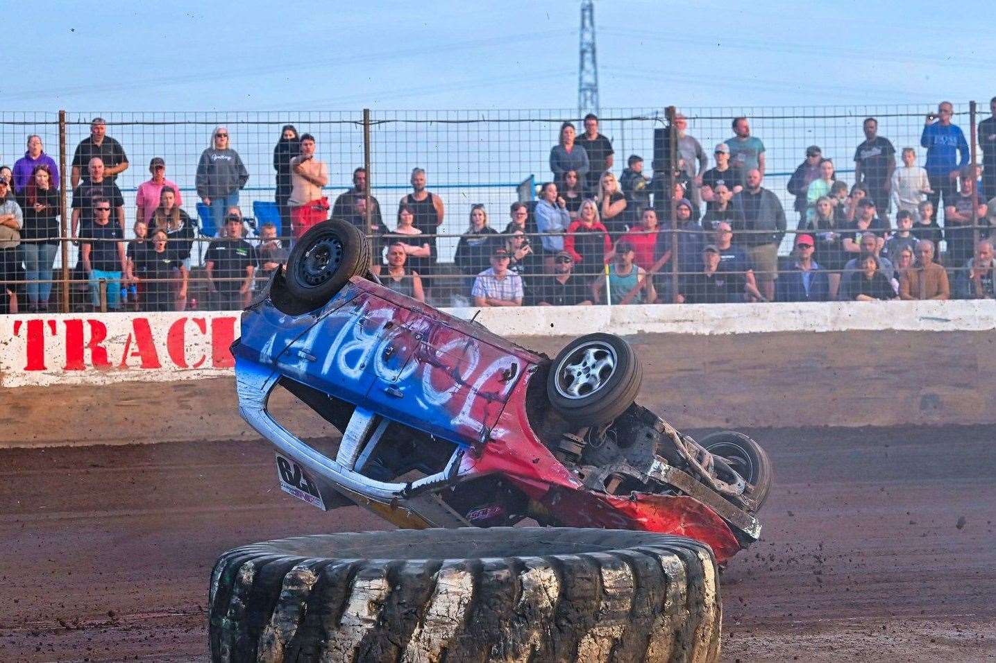 479 Joel Allen rolls over just after taking the lead in the last lap of the 1600 Bangers Final – amazingly he landed on all four wheels and eventually finished fifth. Picture: Jim Harrod